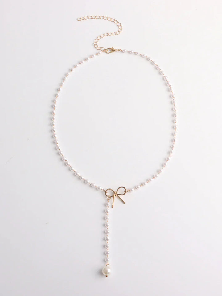 Elegant Bow and Pearl Pendant Necklace